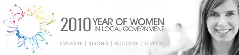 The text 'Women in Local Government' with a smiling white face of a woman on the right. Official logo of the initiative.