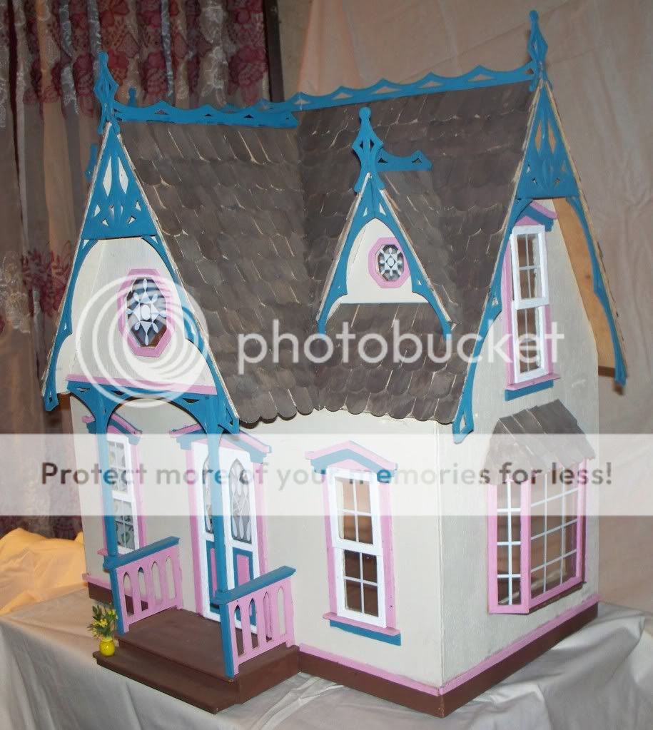 octagon shaped dormer windows and a bay window the detailed trim and 